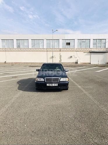 mercedes 190e: Mercedes-Benz C-Class: 2.3 l | 1997 il Sedan — 1