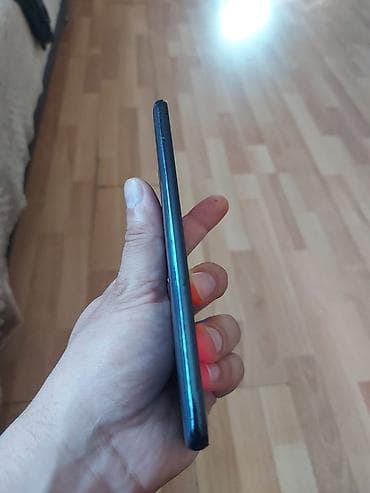 Samsung Galaxy A51, 64 ГБ, цвет - Синий, Сенсорный, Отпечаток пальца, Две SIM карты — 4