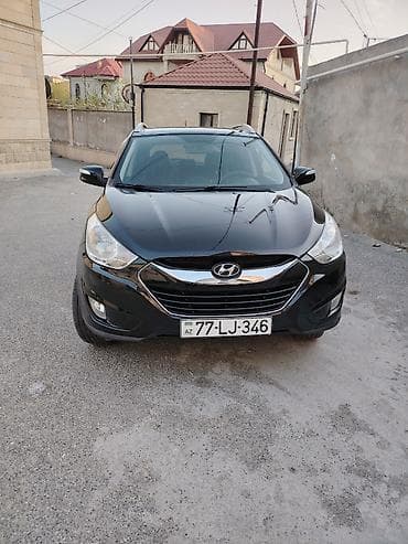 Hyundai Tucson: 0.2 l | 2009 il Krossover — 1