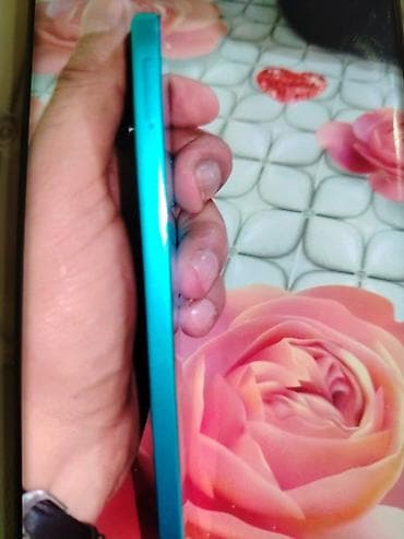 asus telefon qiymeti: Məhsul: Mavi rəngli smartfon Xüsusiyyətlər və dizayn: - Kənarları — 4