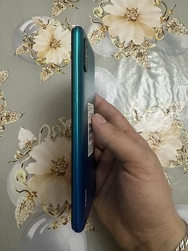 Бытовая техника: Redmi 9A, 32 ГБ, цвет - Голубой, Две SIM карты — 4