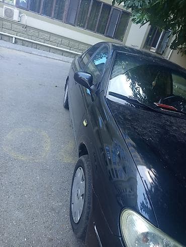Nəqliyyat: Nissan Sunny: 1.6 l | 2004 il Sedan — 1
