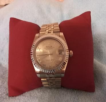 Личные вещи: Rolex saat oz qabinda — 3
