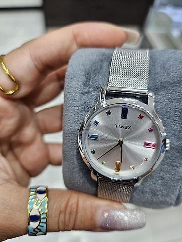 saat qutu: Timex qadın qol saatı - Korpus: parlaq gümüş rəngli metal korpus — 4