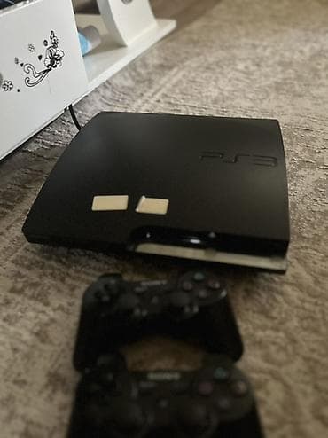 Məhsul: Sony PlayStation 3 (PS3) Slim oyun konsolu + 2 ədəd DualShock lalafo.az -da Məhsul: Sony PlayStation 3 (PS3) Slim oyun konsolu + 2 ədəd DualShock