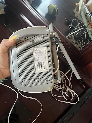 ev modemi: TP-Link TD-W8961N ADSL2+ Wi‑Fi router Xüsusiyyətlər: - Model: TP-Link — 5