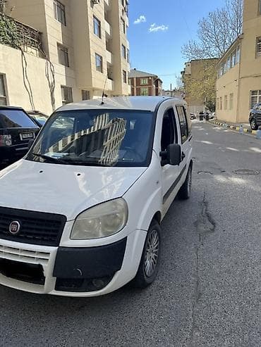 fiad doblo: Fiat Doblo (ağ rəng) – praktik və funksional miniven Xüsusiyyətlər: - — 3