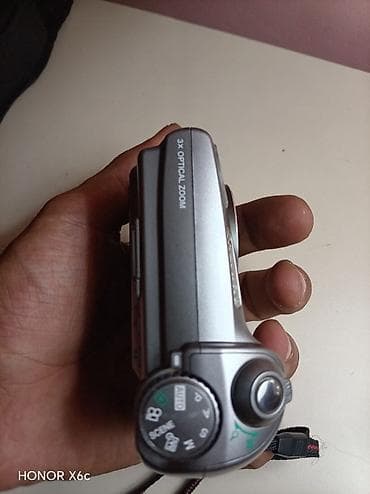 naviqator proqrami: Olympus SP-310 rəqəmsal fotoaparat - Sensor: 7.1 megapiksel - Linza — 2