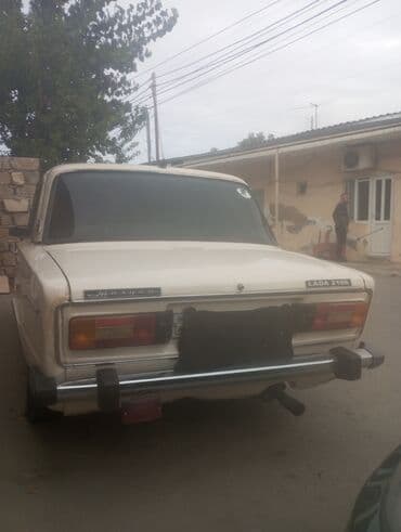 lokbatanda heyet evleri 2025: Lada 2106 sedan - Kuzov: bej rəngli, klassik “şeşorka” gövdə, xrom ön — 2