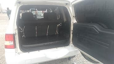 daewoo lanos nece masindir: Mitsubishi Pajero iO (GDI) – ağ rəngli, 5 qapılı kompakt SUV. İlkin — 6