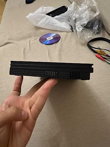 ps1 disk: PlayStation 2 Slim oyun konsolu. Kompakt və nazik korpusa malik PS2 — 4