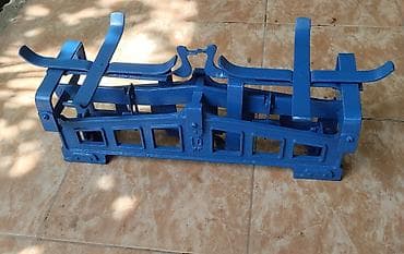 Dəmir tökmədən hazırlanmış mexaniki mal-qara qəfəsi (xüsusilə