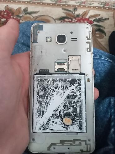 2ci el iphone 7: Samsung J210, 8 GB, rəng - Qara, İki sim kartlı — 7