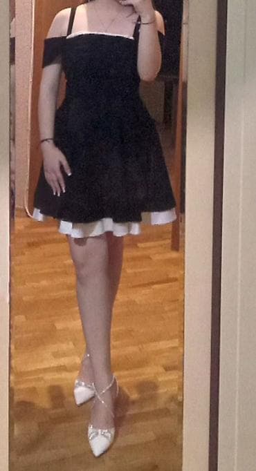 Qara-ağ kokteyl donu - Model: qara rəngdə, ətəyi ağ büzməli haşiyə