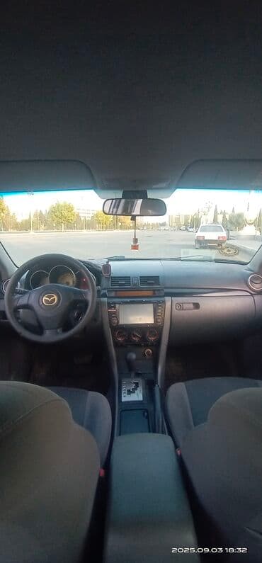 hediye qutusu: Mazda 3: 1.6 l | 2008 il Sedan — 4