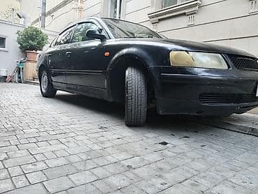 sukan satisi: Volkswagen Passat: 1.8 l | 1988 il Sedan — 2