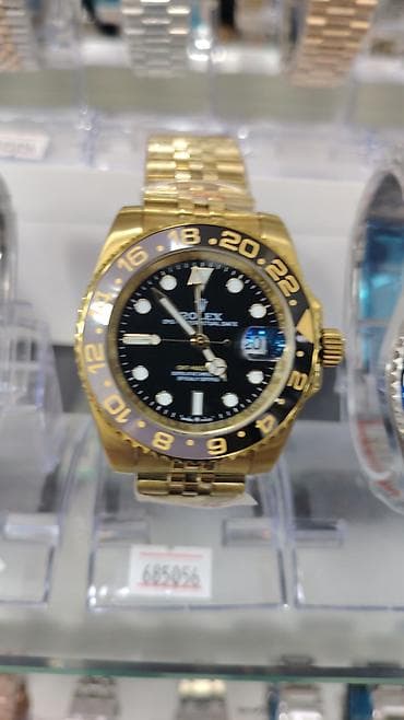 bil: Rolex saat kolleksiyası – vitrində təqdim olunan modellər: - Rolex — 6