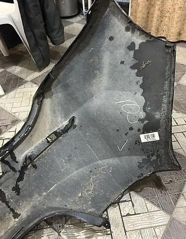 Ehtiyat hissələri: Məhsul: Arxa bamper (orijinal plastik) Rəng: Qara (parlaq) Material — 4