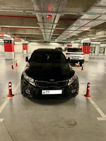 xrom diski: Kia Optima – qara rəng, sedan kuzov. Şəhərdaxili və magistral yollarda — 1