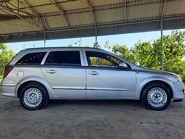 kia rio kreditle satisi: Opel Astra 1.3 turbo dizel (universal) – gümüşü rəngdə, 5 qapılı — 4