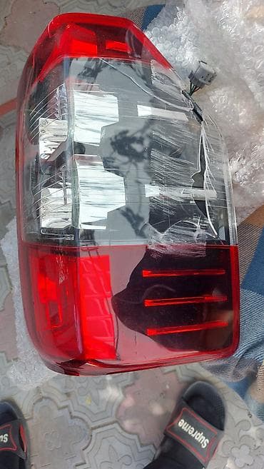 Mitsubishi L200 arxa stopu wuwesi qirigdi