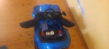 elektrikli uşaq maşını: Uşaq üçün elektrikli minik maşını – mavi rəng - İkioturacaqlı sport — 1