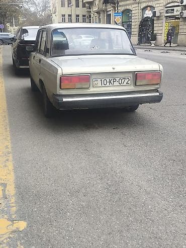 elektromobil satilir: VAZ 2107 sedan - Kuzov: 4 qapılı, gümüşü rəng - Mühərrik: benzin — 4