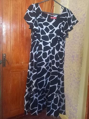 don sekilleri: Ağ-qara naxışlı, qısa qollu qadın donu. Donun qolları və ətəyi büzməli — 1