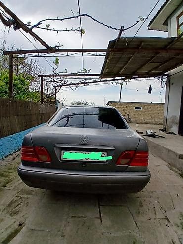 bmw f10 stop: Mercedes-Benz E‑Class W210 sedan - Kuzov: boz rəng, 4 qapılı sedan - — 2
