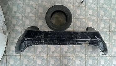 luaz satilir: Avtomobil üçün arxa bufer satılır. Rəngi qara rəngdədir. Bufer — 2