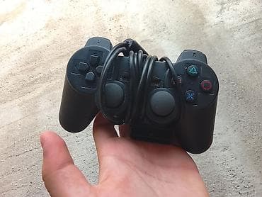 kitab alan: Sony PlayStation 2 Slim (PS2 Slim) oyun konsolu - Model: SCPH-7xxxx — 5