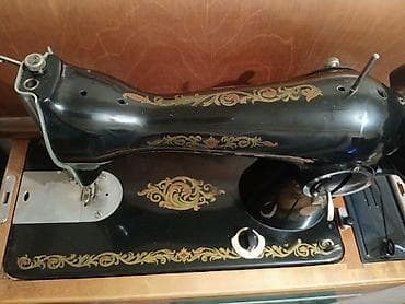 elektro gitara satilir: Yenidir. Mexaniki tikiş maşını – klassik model, qara laklı metal gövdə — 2