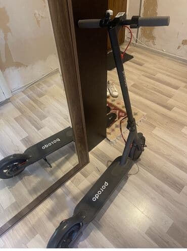 Музыкальные инструменты: Elektrikli skuter – Porodo Cəmi 1 ay işlədilib. Zapas təkərlər var — 1