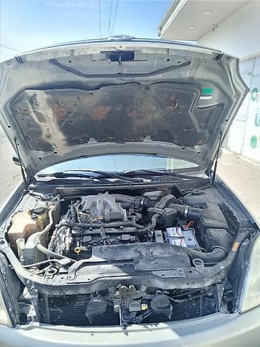 nisan teana: Nissan Teana: 1.6 l | 2003 il Sedan — 10