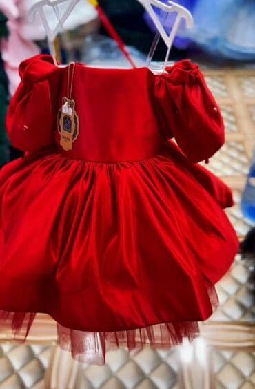 Qırmızı qız uşağı paltarı