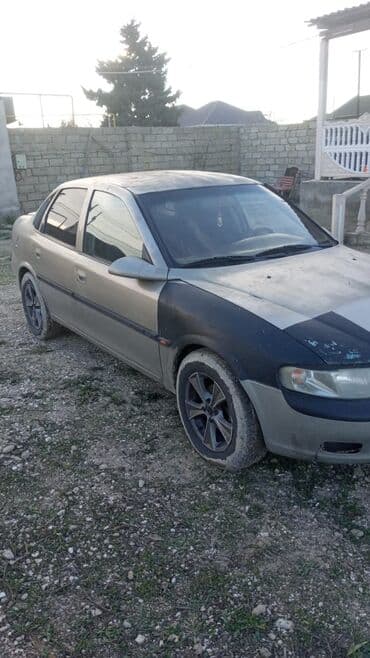 Yağlar və avtokimyəvi maddələr: Opel Vectra B sedan - Ban növü: sedan, 4 qapı - Rəng: gümüşü (ön sol — 2