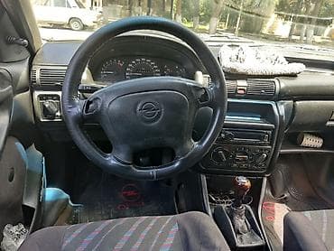 07 disk: Opel Astra: 1.6 l | 1996 il 325358 km Universal — 3