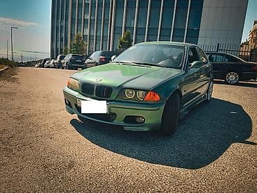 mazda 2: BMW 3 series: 2.5 l | 2000 il Sedan — 1