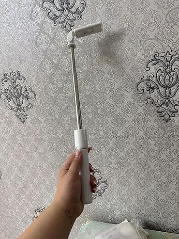 korpuslar: Teleskopik selfi çubuğu – kompakt və yüngül dizayn. Xüsusiyyətlər: - — 1