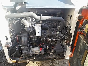 kompressor teh: Bobcat S220 skid steer yükləyici Xüsusiyyətlər: - Model: Bobcat S220 — 3