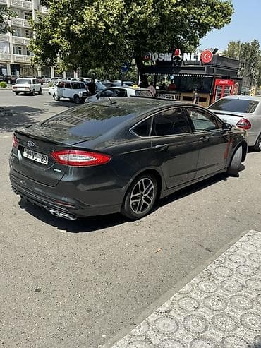 ford escort: Ford Mondeo (Fusion) sedan - Korpus: 4 qapılı sedan, tünd boz rəng - — 2