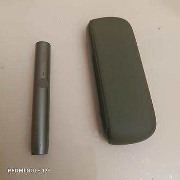 acki sekilleri: IQOS elektron tütün qızdırma cihazı – yaşıl rəng Xüsusiyyətlər: - — 1