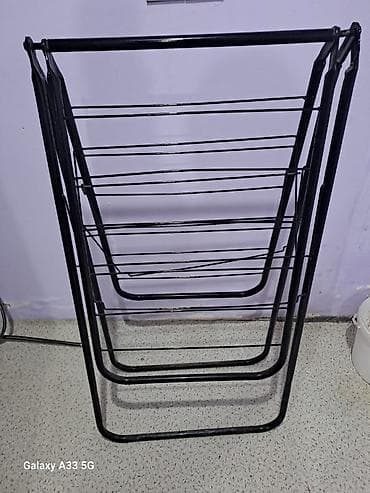 qapi ustu asmalar: Qatlana bilən paltarqurudan asılqan - Material: metal konstruksiya — 1