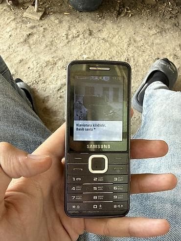 Mobil telefon və aksesuarlar: Samsung S5610, rəng - Qara, Düyməli — 4