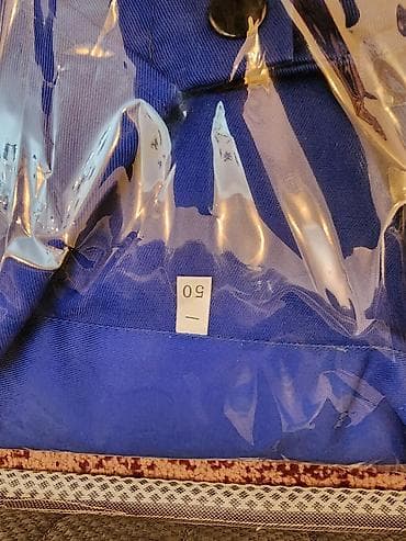 canta modelləri: Mavi rəngli kişi kostyumu – paketlənmiş halda. mavi kamizonlar 35 — 4