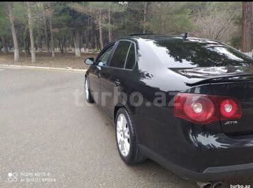 volkswagen jetta 2: Volkswagen Jetta: 2 л | 2009 г. Седан — 2