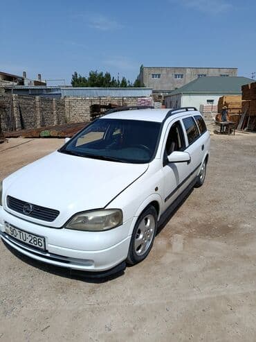 kvadrasikl satışı: Ətraflı məlumat üçün zəng edin, vatsapa yazın.Opel Astra Caravan — 6