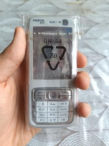 nokia 107: Nokia N73, rəng - Gümüşü, Düyməli — 1