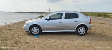 tirə cəkən: Opel Astra: 1.8 l | 1998 il 296000 km Hetçbek — 2