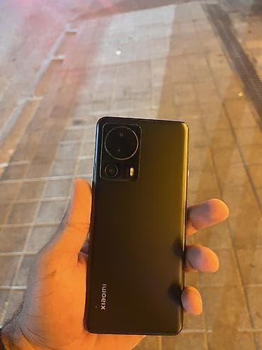 bakcell pulsuz zeng: Xiaomi 13 Lite, 256 GB, rəng - Qara, 
 İki sim kartlı — 3